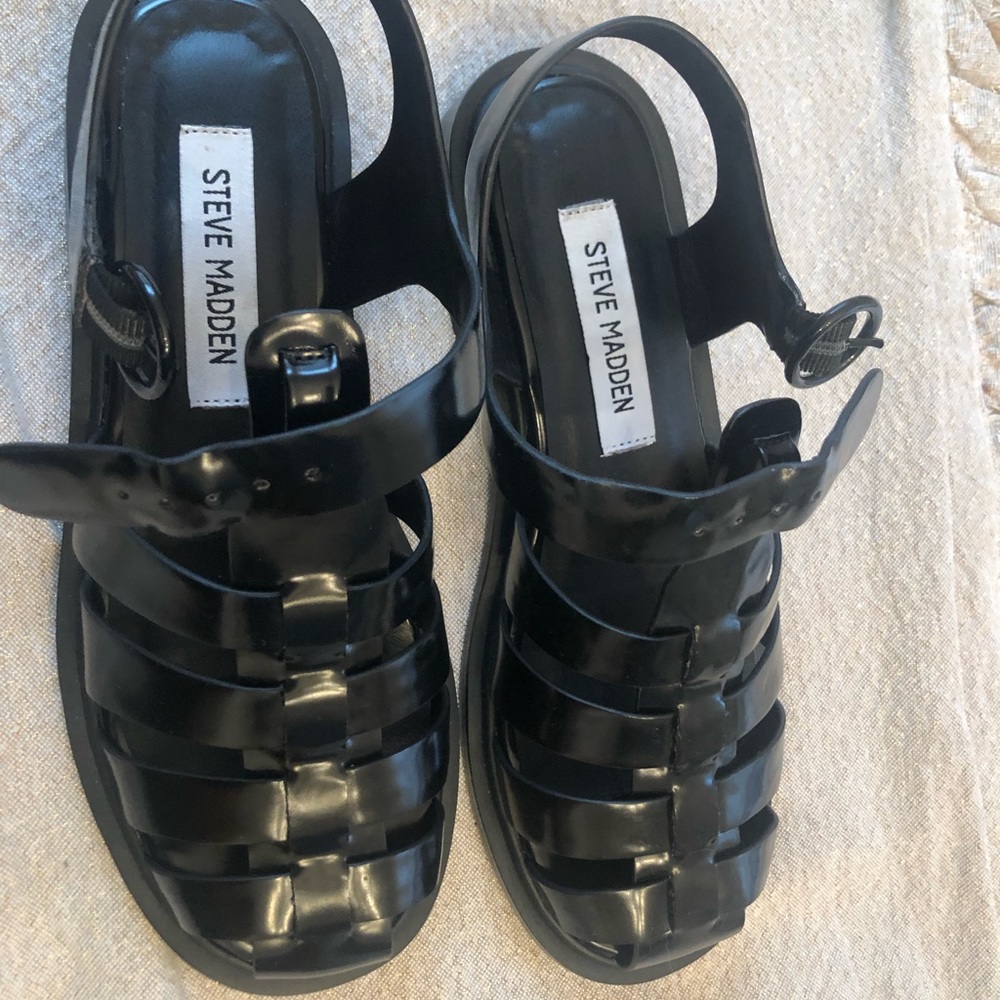 Steve Madden jelly sandals.